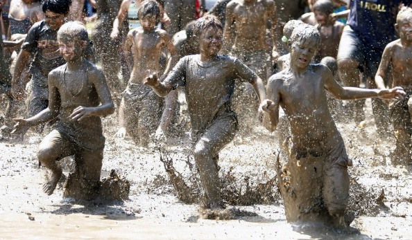 Kids Get Dirty At Annual Mud Day Festivities