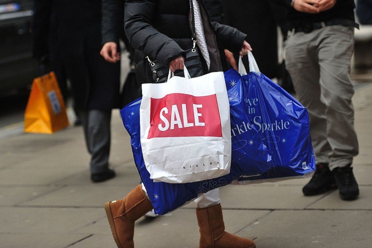 Christmas Shoppers Hunt For Gifts On The High Street