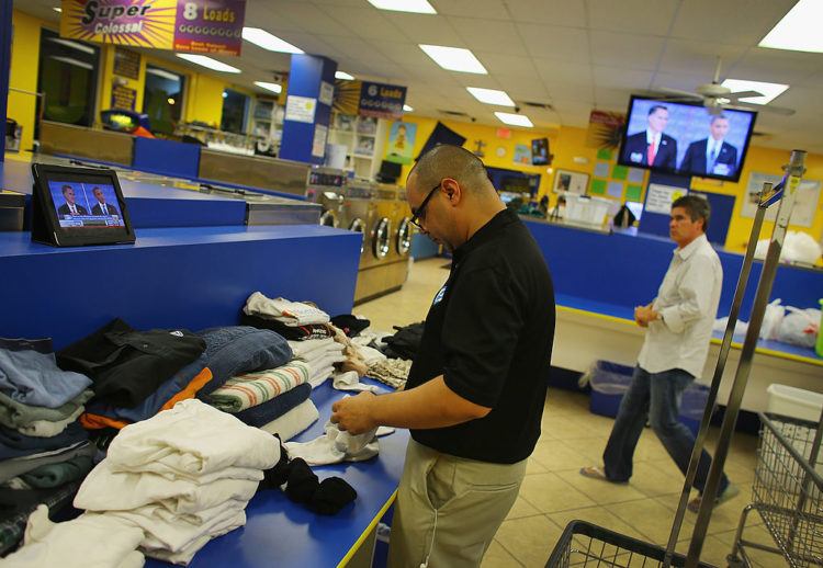 man doing laundry