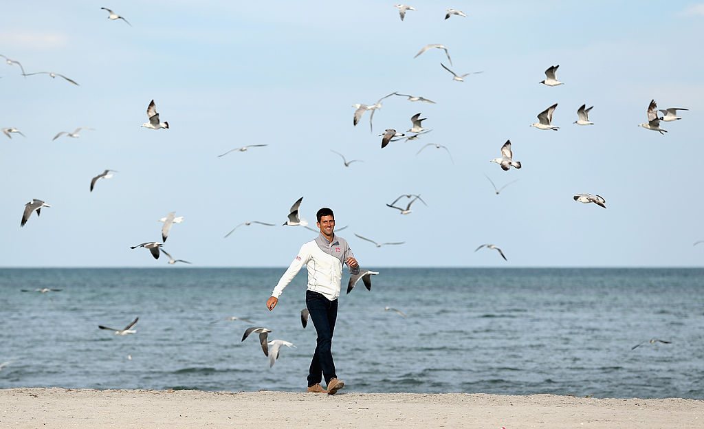 man walking on beach