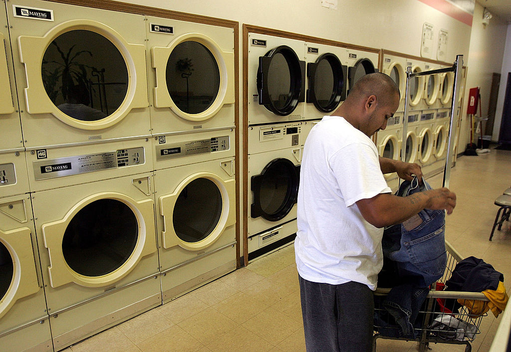 man doing his laundry