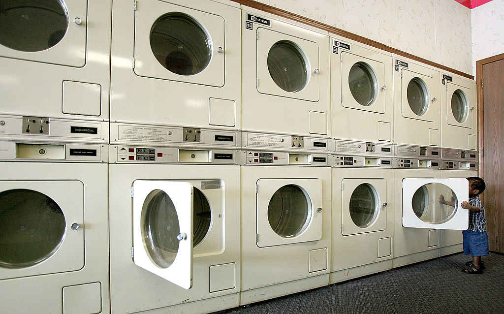 row of laundry machines