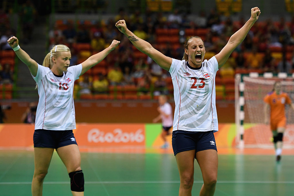 happy handball players in norway