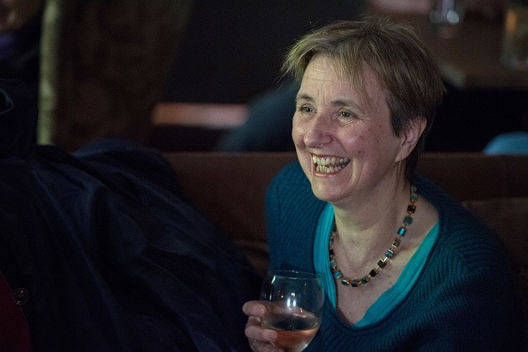 lady drinking alcohol at bar