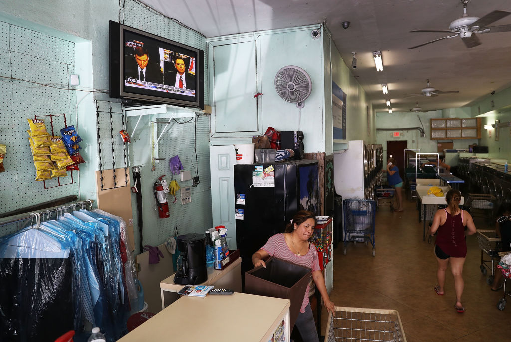 people in laundromat