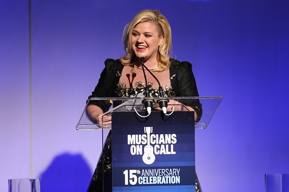 Kelly Clarkson speaks onstage 