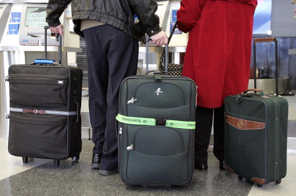 people carrying luggage