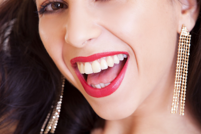 Americans have straight white teeth