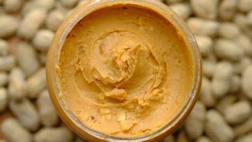 brown powder in brown round container