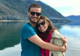 Hugging Couple Near the Body of Water