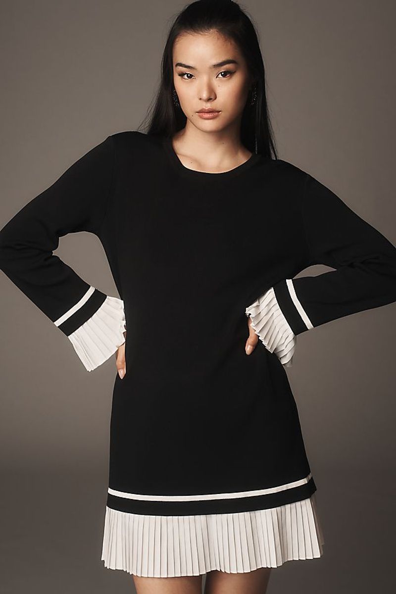 Best short: English Factory Long-Sleeve Crew-Neck Ruffle-Hem Mini Dress ($90)