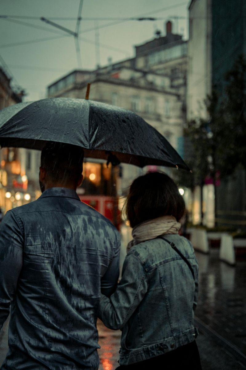 Sharing Her Umbrella in Unexpected Rain