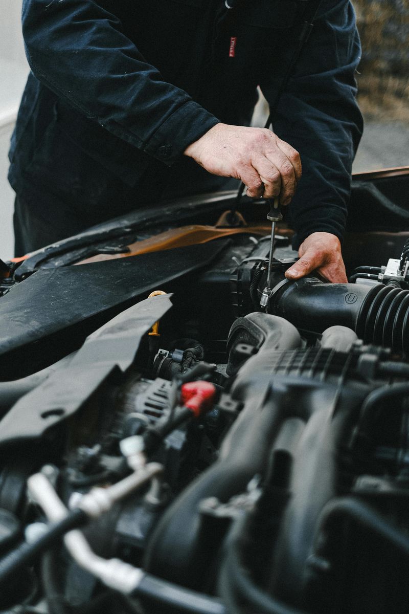 Checking or Fixing Their Car