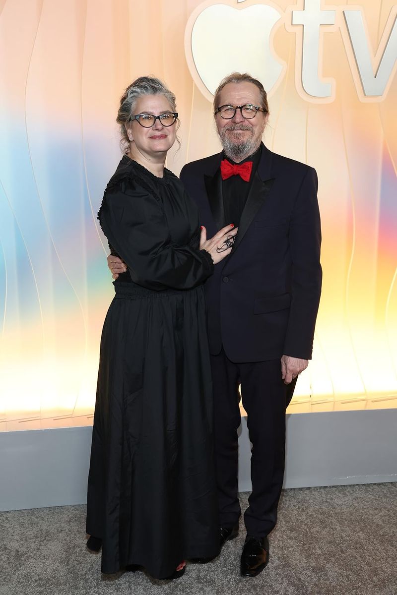 Gary Oldman and Gisele Schmidt