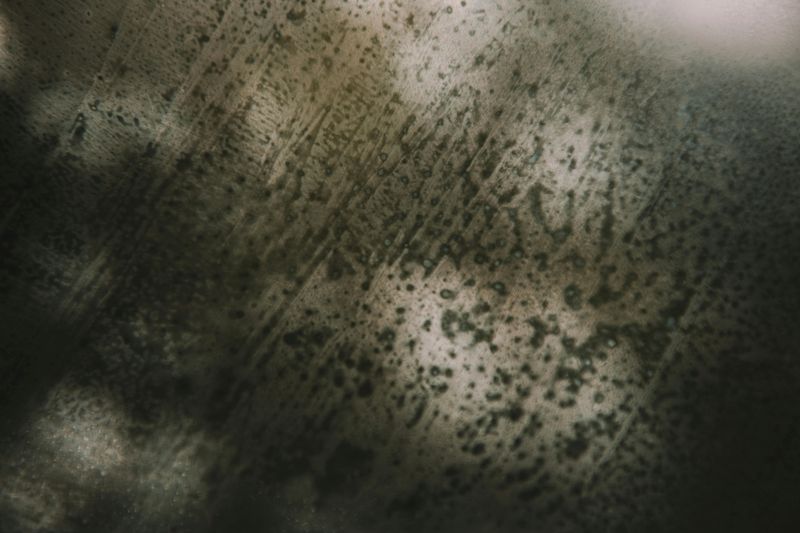 Windows and Mirrors Streaked with Smudges