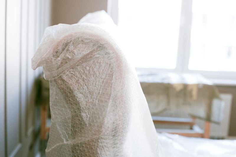 Furniture Wrapped in Plastic