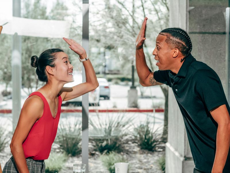 He Celebrates Her Success